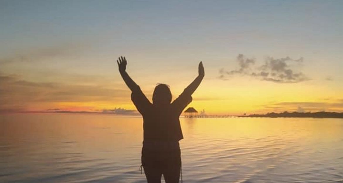 Clientes felices en la playa